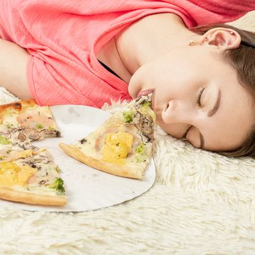 girl overeat pizza