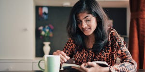 Girl reading book with a coffe mug