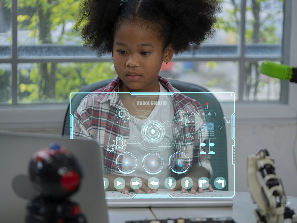 https://hips.hearstapps.com/hmg-prod/images/girl-thinking-and-analyzing-a-robot-program-royalty-free-image-1651867434.jpg?crop=0.88889xw:1xh;center,top&resize=1200:*