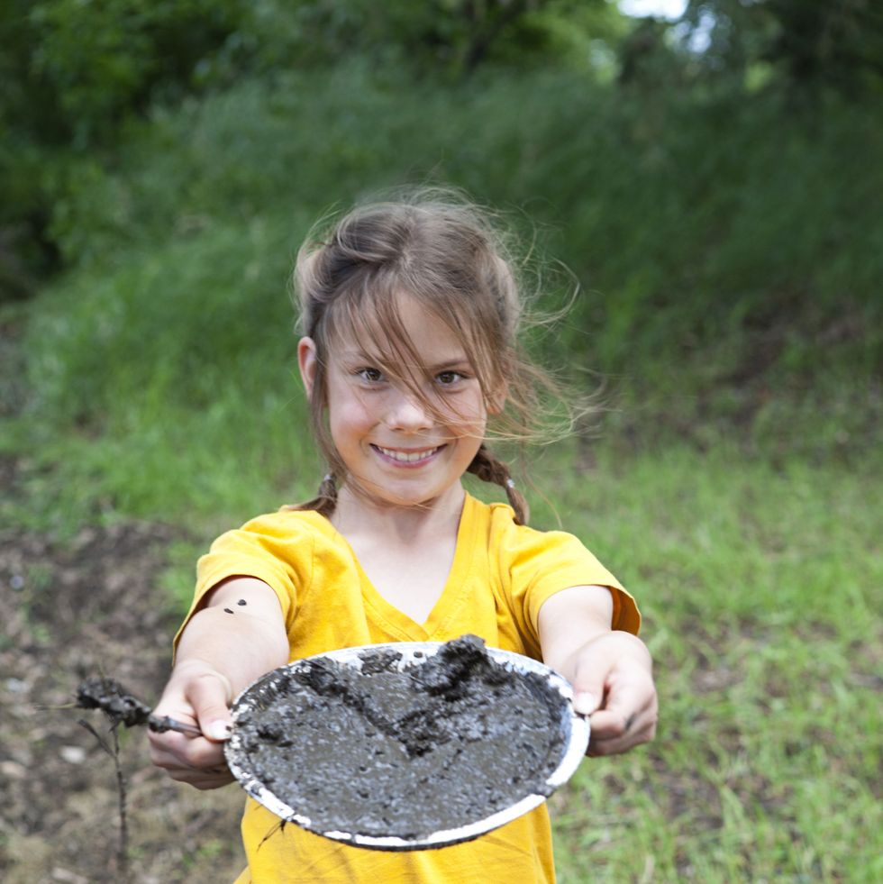 girl with mud pie fun activities for kids
