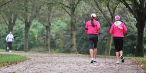 girls running amp in autumn fog