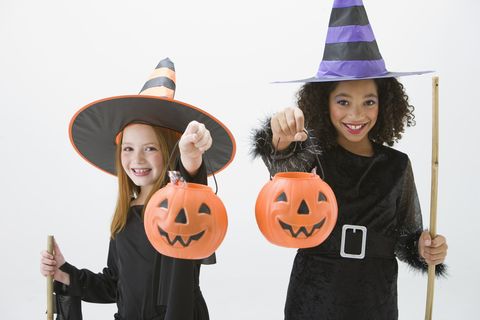 last minute girls witch costume with plastic pumpkin trick or treat buckets