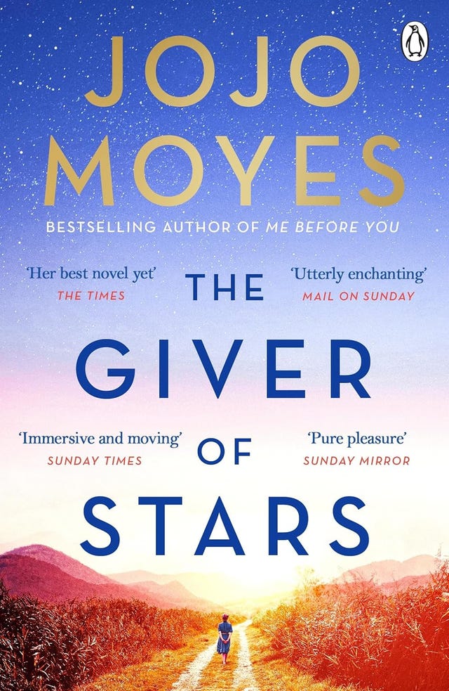 cover design of the giver of stars by jojo moyes featuring a pathway and mountains