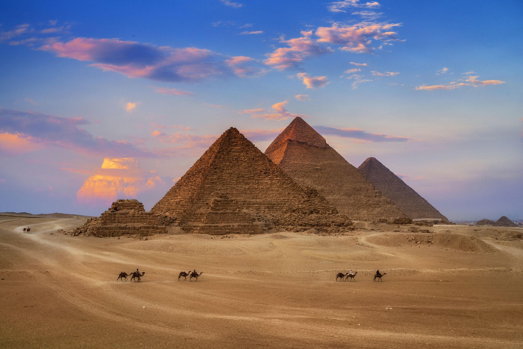 giza-egypt-pyramids-in-sunset-scene-wonders-of-the-royalty-free-image-1663587445.jpg