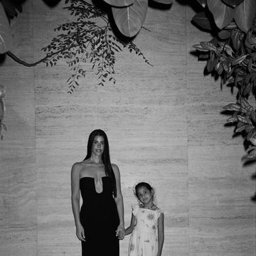 a black and white photo of gabriella khalil and daughter