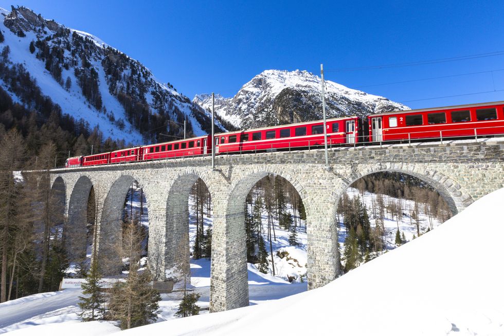 Glacier Express train on viaduct, Switzerland
