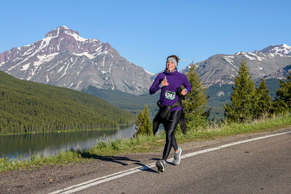 runner participating in a race in a mountainous landscape vacation races glacier half marathon best national park half marathons runner's world magazine