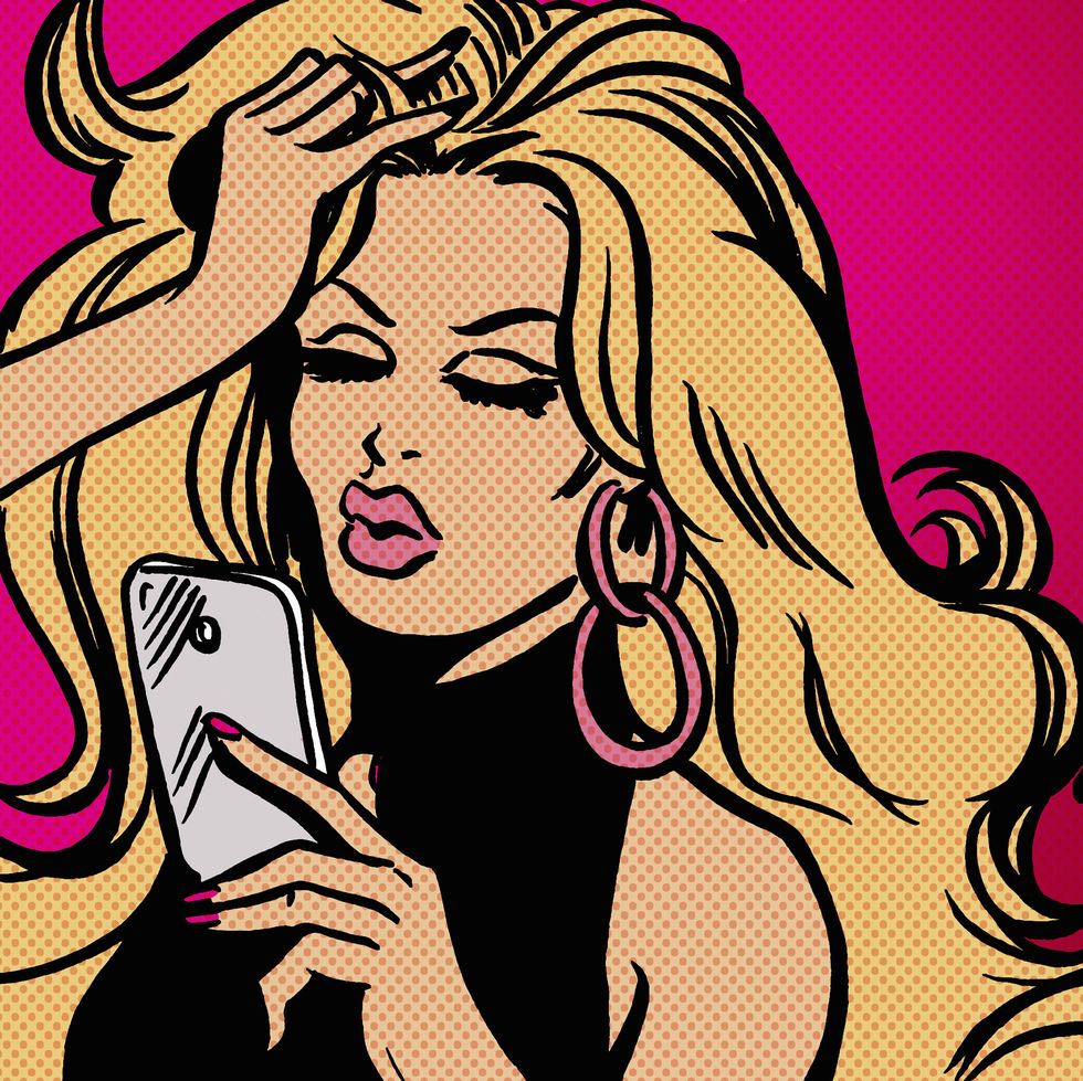 Glamorous woman text messaging using smart phone