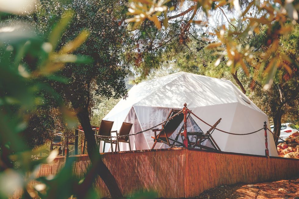 glamping dome tent in forest