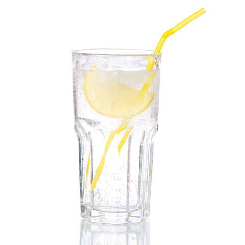 glass carbonated water with lemon