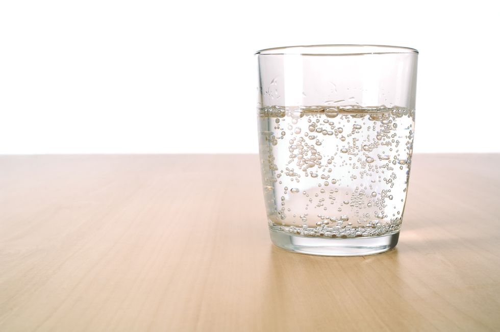 glass of sparkling water on table