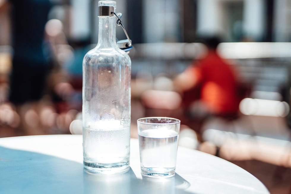 glasses of ice sparkling water on dining table during brunch