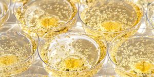 Glasses with bubbling champagne at a wedding