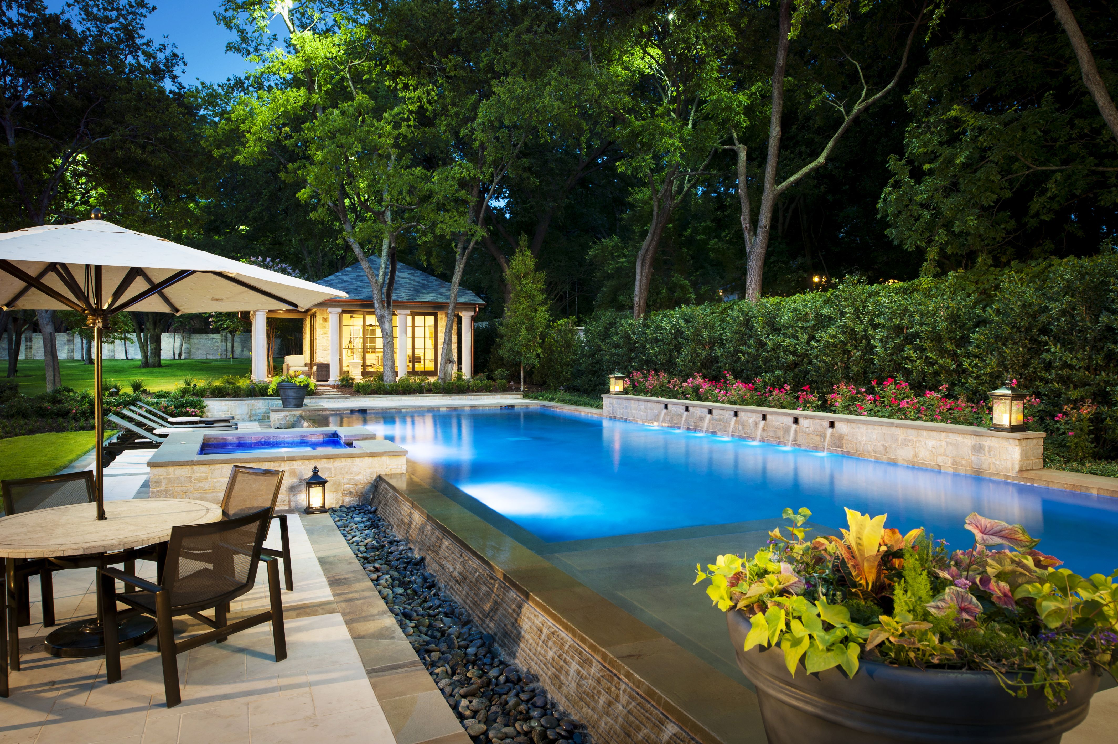 luxurious backyard landscaping ideas with fancy pool