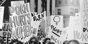 feminist marchers going through new york city