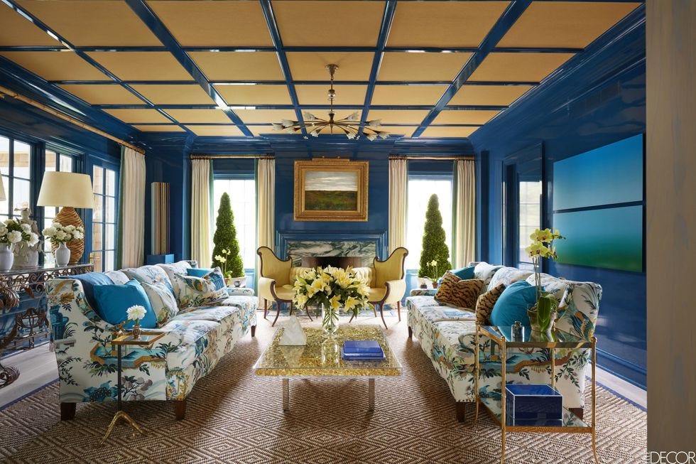 Green, Interior design, Lighting, Room, Floor, Living room, Ceiling, Couch, Furniture, Real estate, 