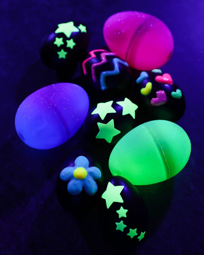 glow in the dark eggs decoratively designed plastic eggs glowing under uv light with various patterns