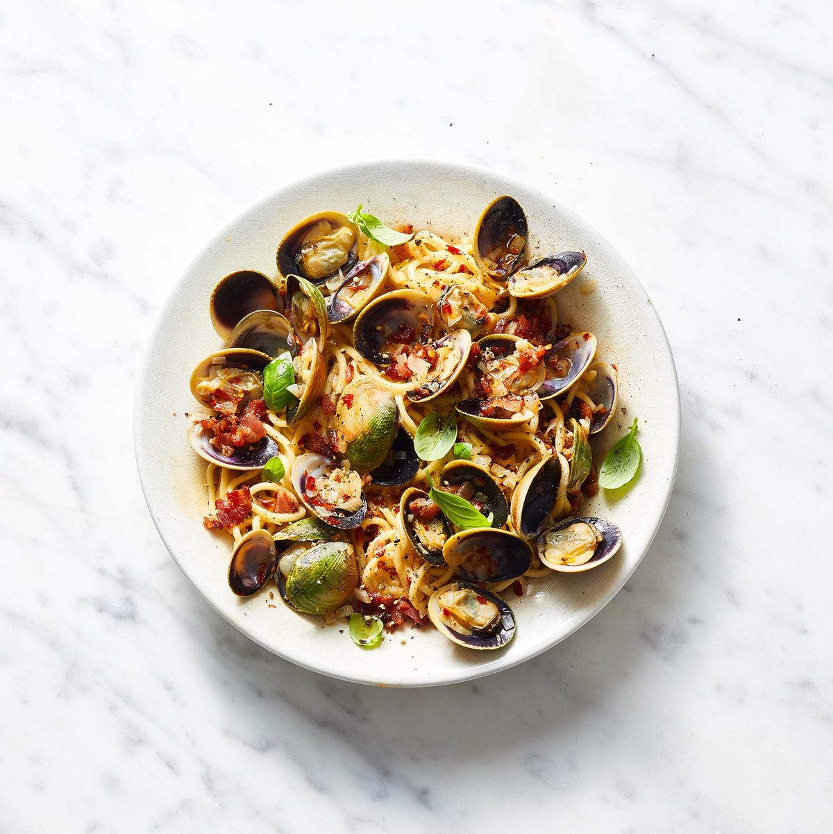 gluten free spaghetti with clams and bacon crumbs