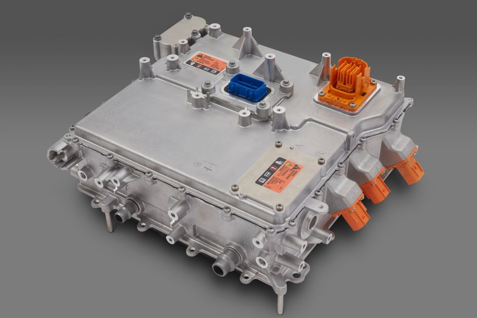 the power electronics of gm’s ultium based evs will be integrated directly into the ultium drive units, reducing costs, weight and manufacturing complexity while increasing reliability the inverter and other power electronics like the accessory power module and onboard charging module will reside within boxes such as this inside gm’s ultium drive units