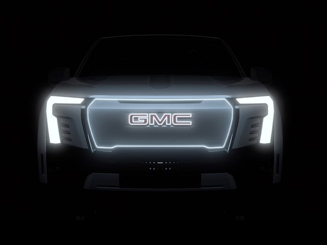 gmc gives a first look at its upcoming electric sierra denali pickup, previewing the truck’s unique and premium exterior lighting sequence