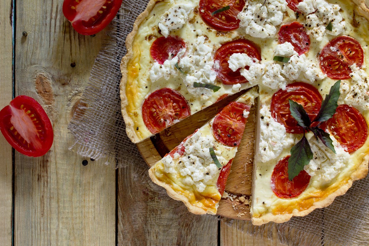 image of Nadiya Hussain's Caramelised Onion and Goats Cheese Tart recipe by Red Online