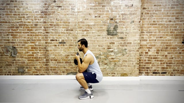 tamir practicing the goblet squat exercise