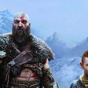 god of war ragnarok promo art with kratos and son atreus looking in different directions in front of an icy mountain range