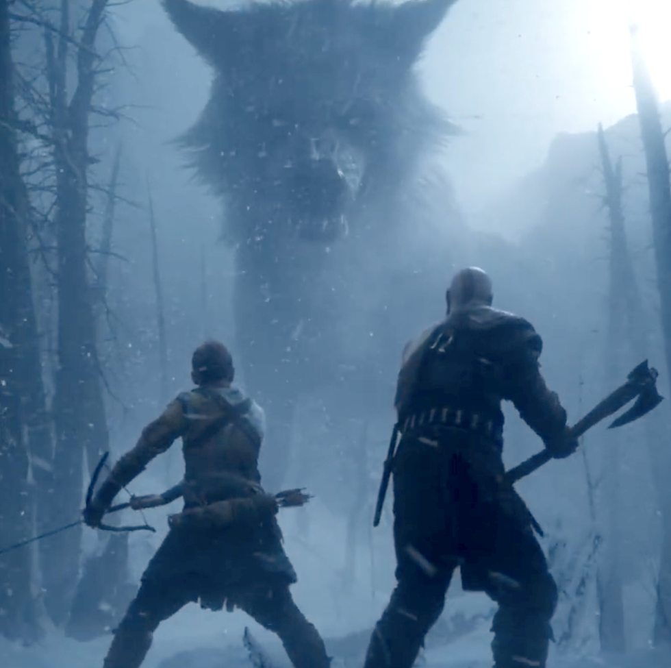dieu de la guerre ragnarok, kratos et son fils atreus affrontent un loup géant dans une forêt enneigée