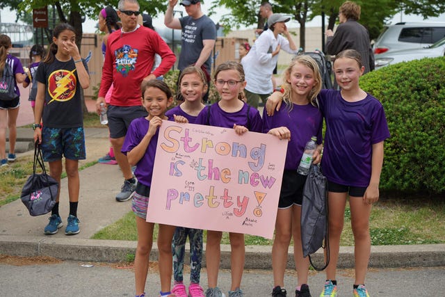 go girls go participants after completing a 5k to complete the end of their first season