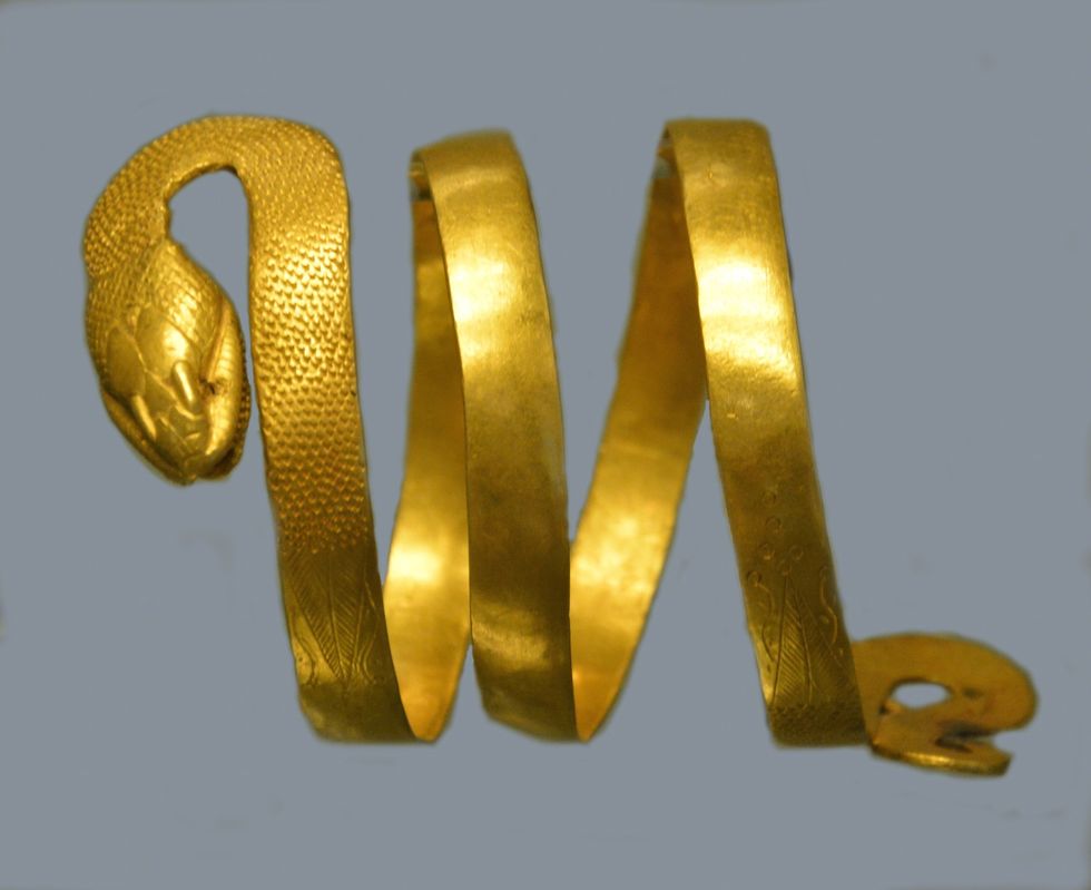 Gold bracelet in the shape of a snake.