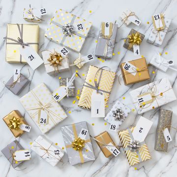 gold and silver wrapped advent gift boxes