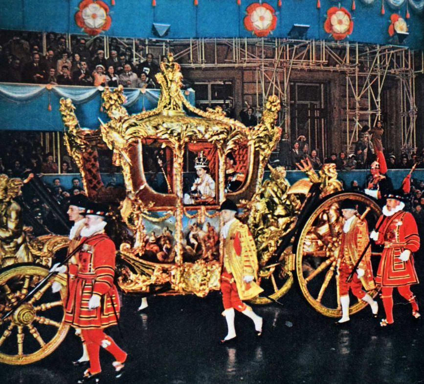 queen elizabeth rides to her coronation in the gold state coach in 1953