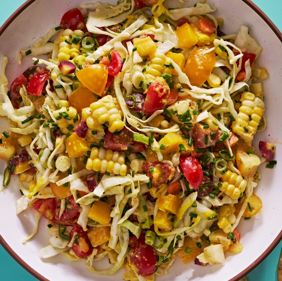 golden girl salad with corn, cabbage, and cherry tomatoes by baked by melissa