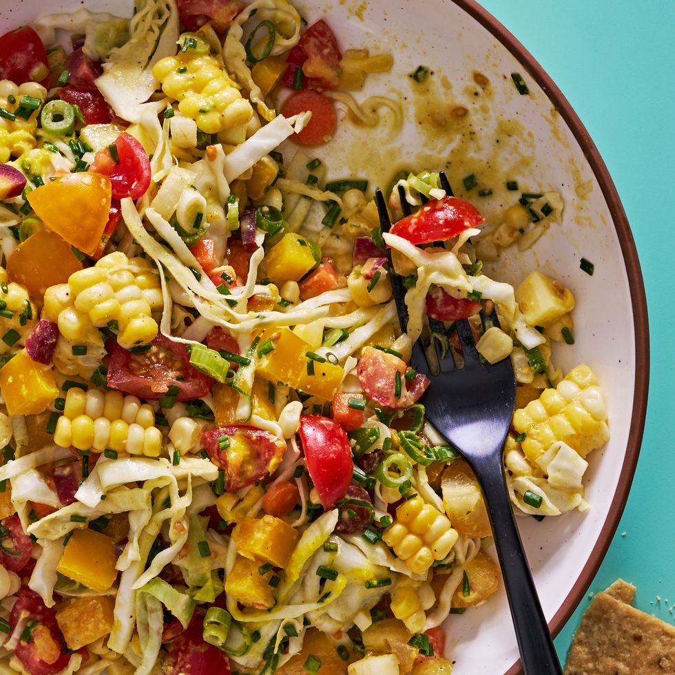 golden girl salad with corn, cabbage, and cherry tomatoes by baked by melissa