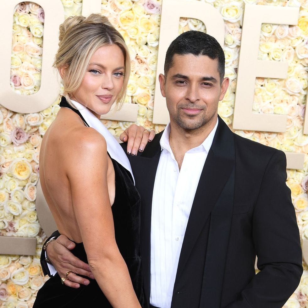 a man and woman posing for a picture