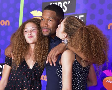 former nfl player michael strahan c and daughters, isabella strahan and sophia strahan attend nickelodeon kids choice sports awards 2018 at barker hangar