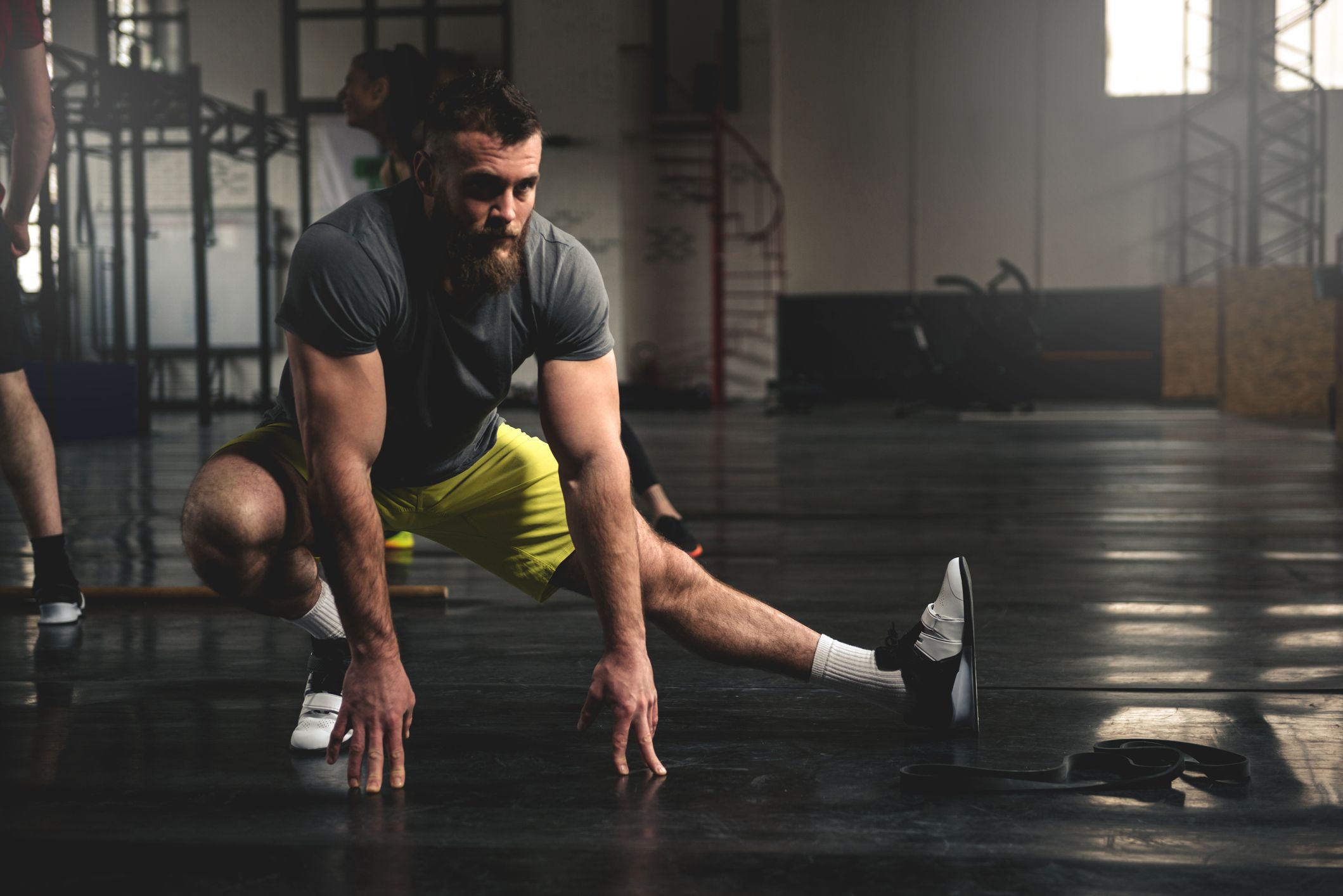 The 5 best stretches to open your hips before lifting - Men's Journal