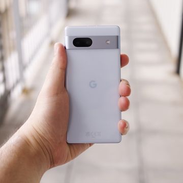 google pixel 7a being held up outside