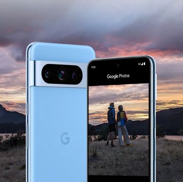 google pixel in bay blue from the front and back in front of nature
