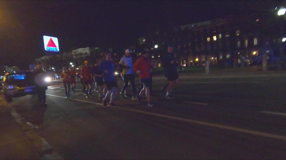Dave McGillivray and crew along the course of their "Night Shift" Boston Marathon run.