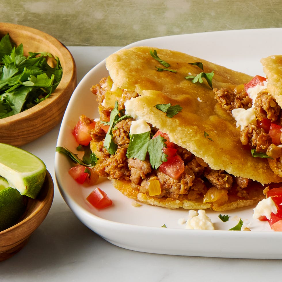 traditional masa harina gorditas, pan fried and and stuffed with chorizo, cheese, tomatoes, and cilantro