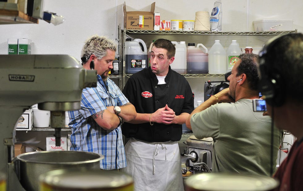 the food network's show, "diners, drive ins and dives" films at the port hole restaurant on the wat