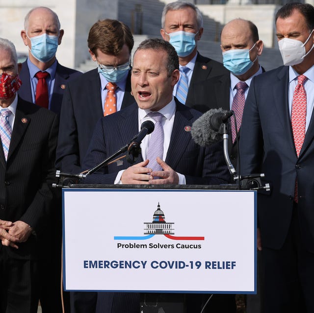 washington, dc   december 03  rep josh gottheimer d nj c and rep tom reed r ny 3rd r, co chairs of the bipartisan problem solvers caucus, hold a news conference with fellow members of congress to highlight the need for bipartisan, bicameral covid 19 relief legislation outside the us capitol on december 03, 2020 in washington, dc with the holiday season approaching and the legislative session coming to a close, federal government funding for critical coronavirus relief programs is set to expire as the us faces daily records for infections, hospitalizations, and deaths photo by chip somodevillagetty images