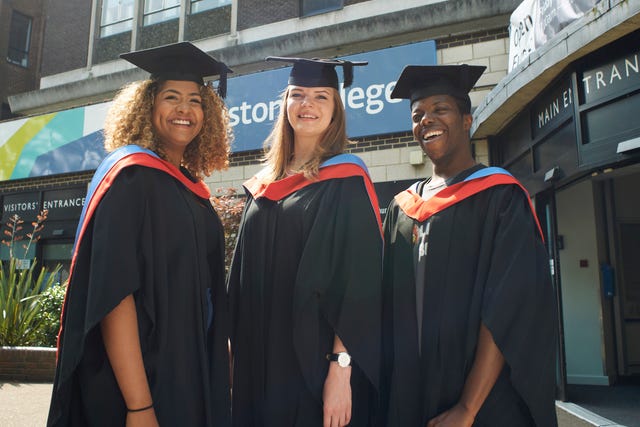 trio of graduates