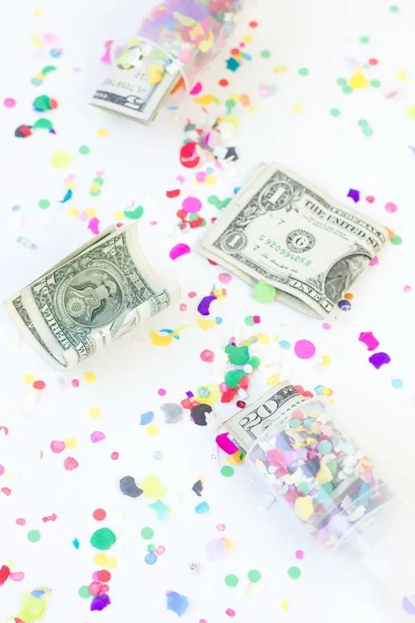 Graduation party ideas, money in small plastic cups with confetti
