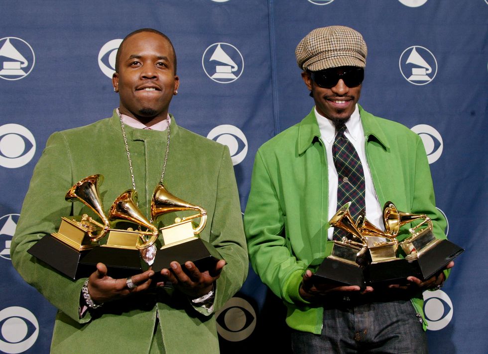 los angeles   february 8  musical artists big boi left and andre 3000 of oukast pose with their six grammys backstage in the pressroom at the 46th annual grammy awards held on february 8, 2004 at the staples center, in los angeles, california photo by frederick m browngetty images