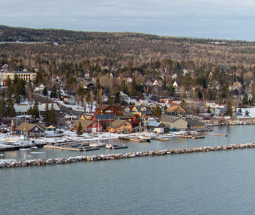 aerial view of lakefront in grand marais minnesota in winter