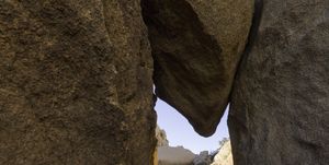 Granite boulder jammed between rocks, California