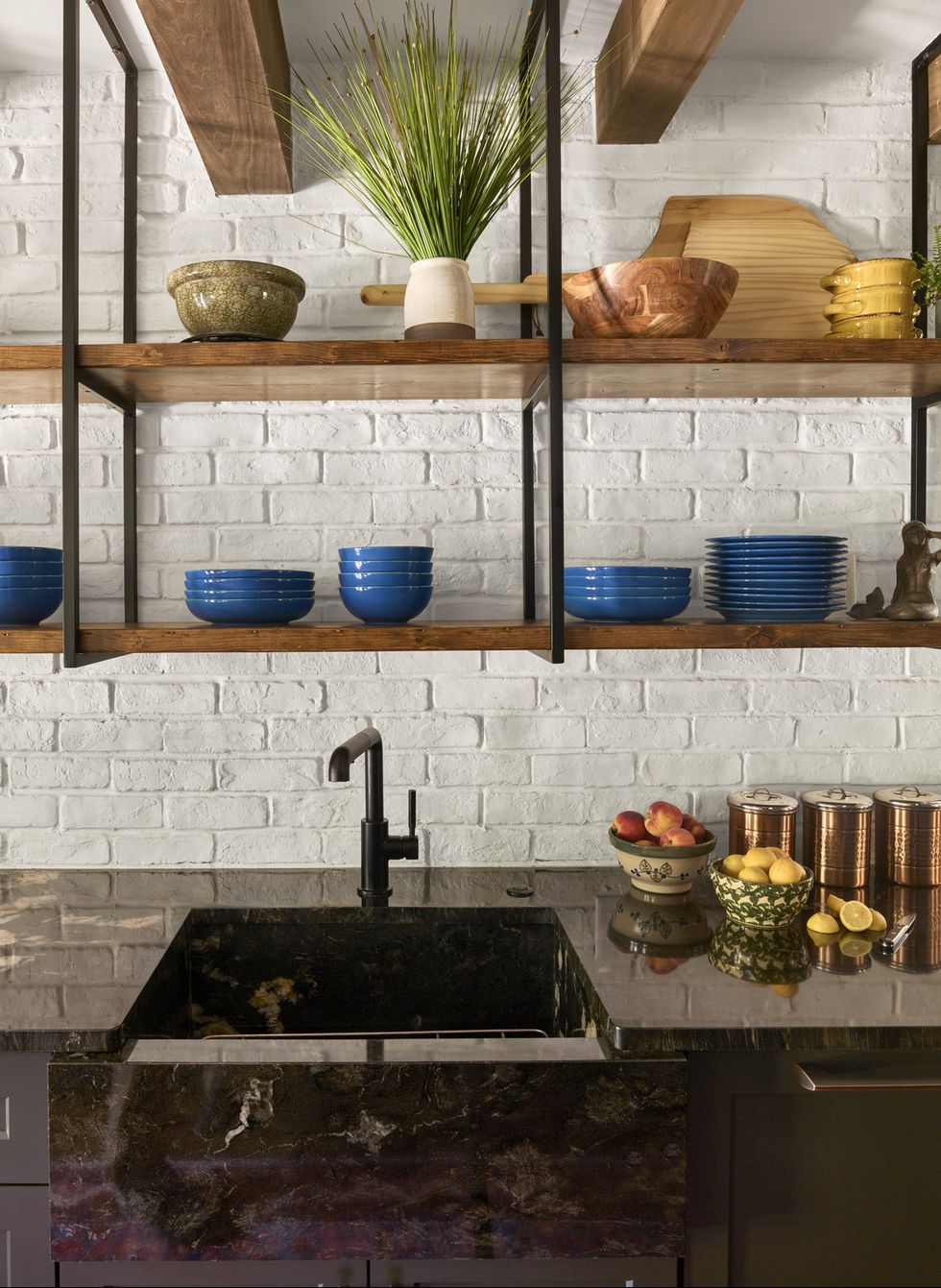 smart shelving to offset dark cabinets and counters, the team wanted the white brick walls to shine through enter custom steel and wood open shelving faucet brizo brick veneer avalon flooring discontinued