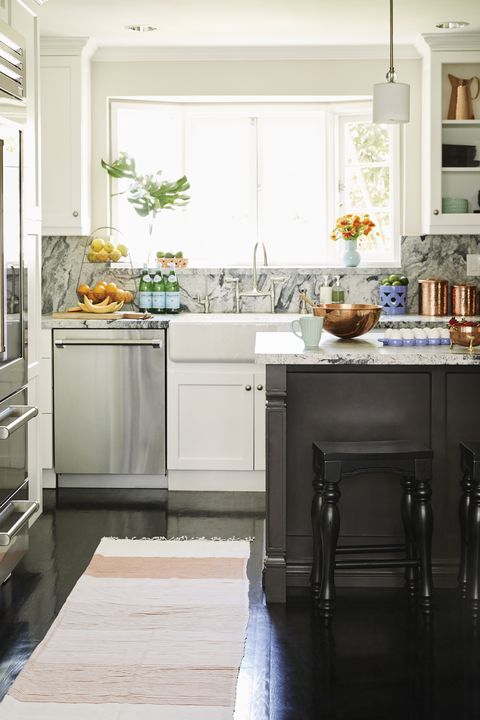 granite kitchen island with bright window